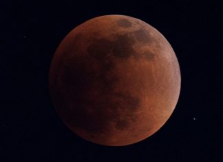 Full lunar eclipse creates rare super blood Moon